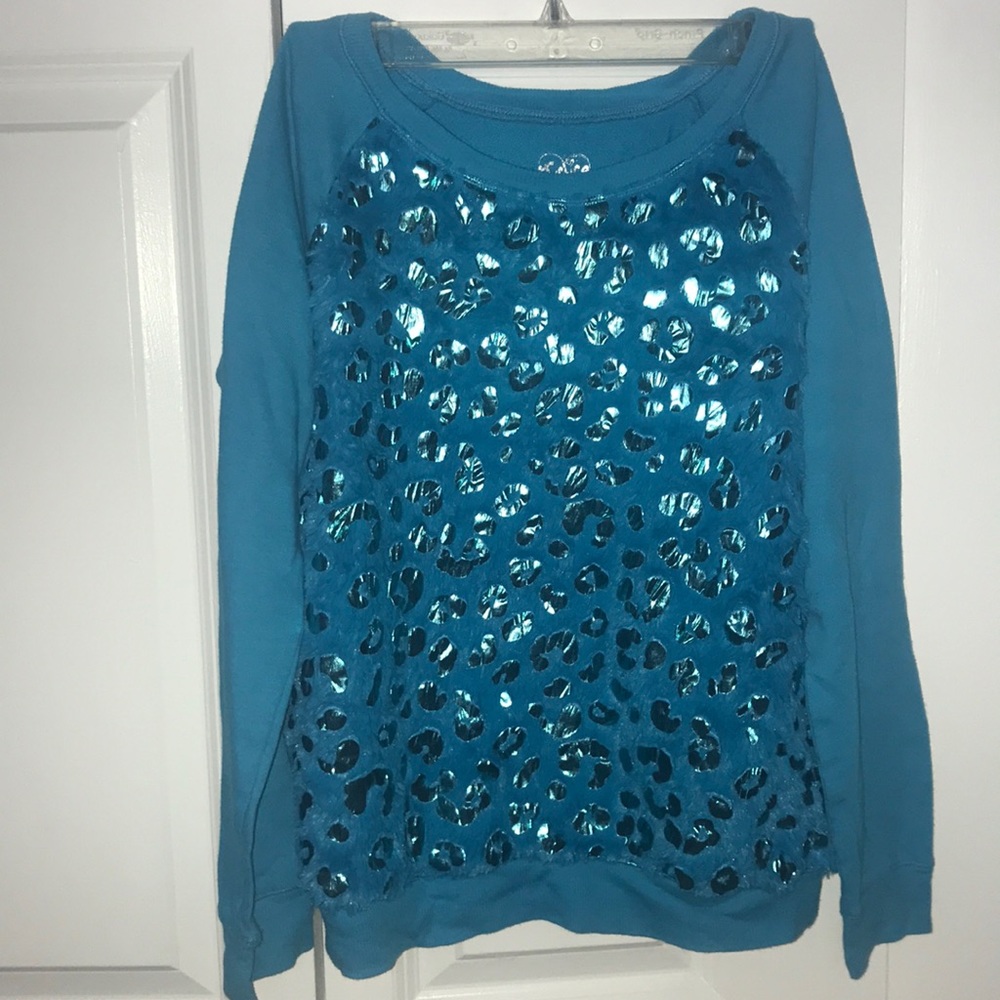 A long sleeve, blue colored shirt with a print!!